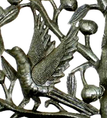 Close-up- Tree and bird steel drum metal art.