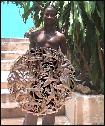 A finished Haitian metal art wall design.