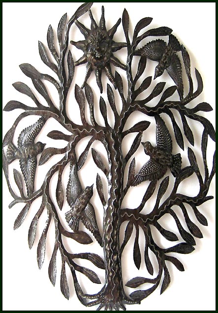 Decorative metal wall art design. Tree with birds and sun. 