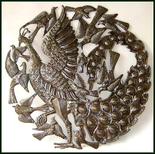 Haitian metal art peacock design. 