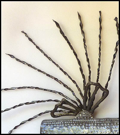 metal Haitian mask