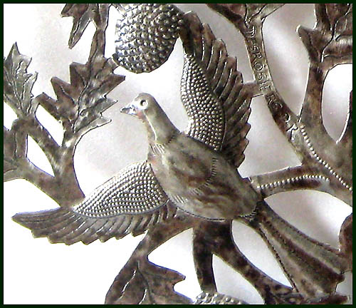 Close-up of Haitian metal art Tree of Life